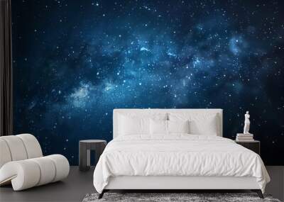 Blue night starry sky, space background. Wallpaper with a serene blue night sky Wall mural