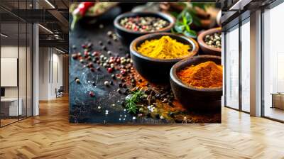 Colourful various herbs and spices for cooking on dark background. Indian cuisine. Pepper, salt, paprika, basil, turmeric Wall mural