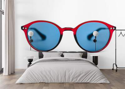 Fashion sunglasses with red plastic-framed isolated on white background Wall mural