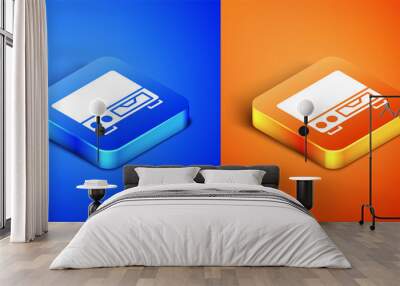 Isometric Old video cassette player icon isolated on blue and orange background. Old beautiful retro hipster video cassette recorder. Square button. Vector Wall mural