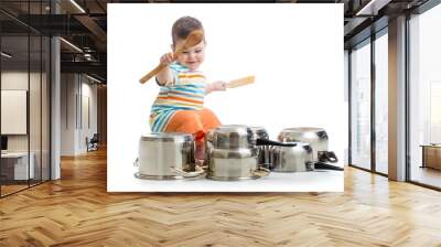 baby boy using wooden spoons to bang pans drumset Wall mural