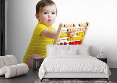 Baby playing with abacus toy Wall mural