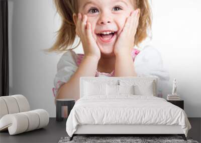 child girl with hands close to face isolated on white background Wall mural