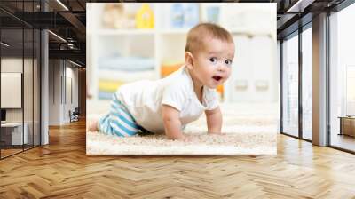 crawling baby boy indoors Wall mural