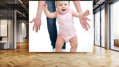 First steps of baby isolated on white Wall mural