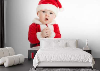 funny baby in Santa Claus clothes Wall mural