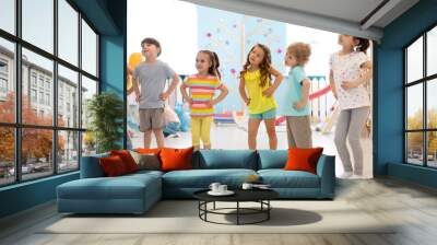 Group of children are engaged indoor physical exercise Wall mural