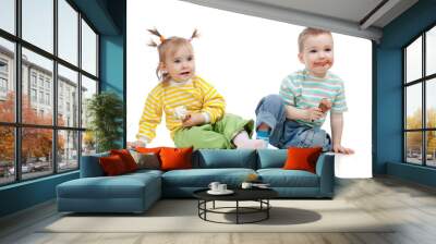 happy children little girl and boy with ice cream in studio isol Wall mural