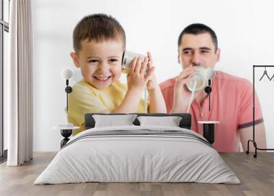 Kid and dad having a phone call with tin cans Wall mural