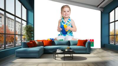 little cheerful child with construction set over white backgroun Wall mural