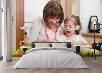 mom and child cooking at kitchen Wall mural