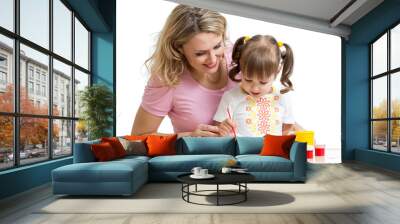 Mother and kid girl painting together Wall mural