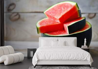 Melon and watermelon slices on a wooden surface. Selective focus. Macro. Wall mural