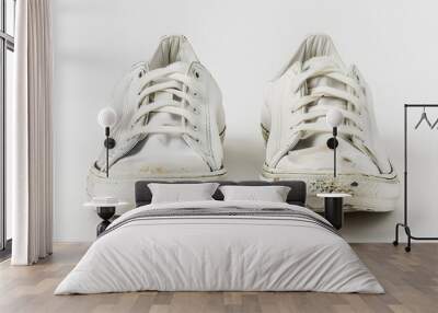 Pair of white used old dirty basic sneakers isolated on white background Wall mural