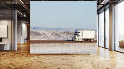  Semi truck with white trailer driving on highway Wall mural