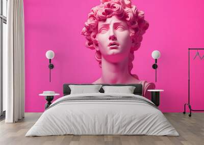 Pink antique human bust on pink background.  Wall mural