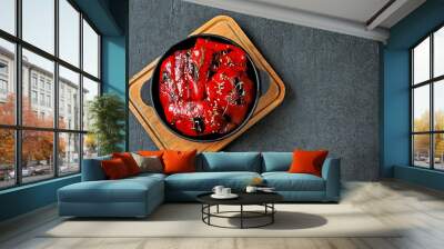 Red paprika grill in a cast iron skillet. Wall mural