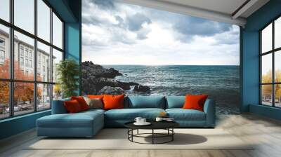 Rocky coastline background, sea view Wall mural