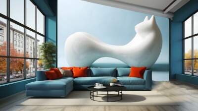 Soft white chair in the shape of a cat furniture modern design, isolated on background Wall mural