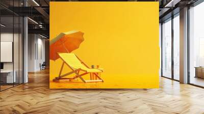 Yellow beach chair with an umbrella on a yellow background. Studio photography for summer vacation and travel concept. Wall mural