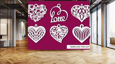 Set of decorative pendants with lace openwork hearts. Decor for for a wedding or February 14 (Valentine's Day). White objects on a red background. Template for laser cutting, wood carving, paper cut. Wall mural