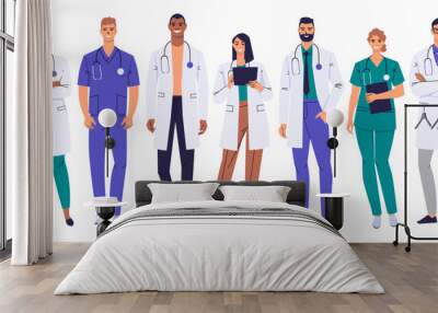 A team of medical workers. Doctors, nurses isolated on white. Characters in white coats and scrubs. A group of medical personnel are standing in full height. Male and female medics. Flat vector. Wall mural