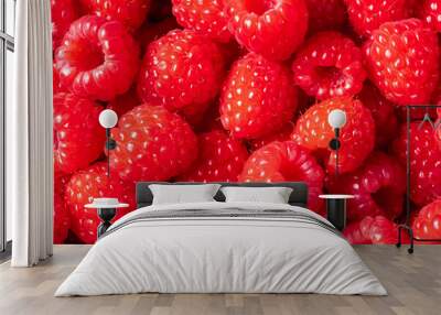 Raspberry closeup background. Top view of Raspberries. Texture top view of fresh Raspberries. Wall mural