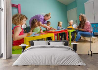 children and tutor study together at the creative school Wall mural