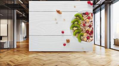 healthy food oatmeal muesli and fresh berries top view background Wall mural