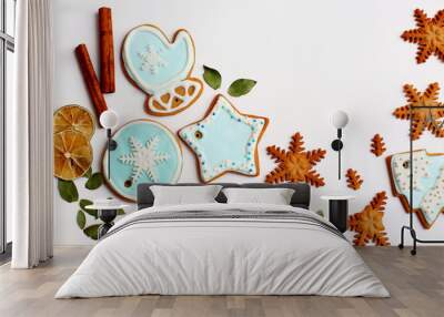 ginger cookies in blue glaze on a white background Wall mural