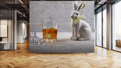 Whiskey im Glas mit Eiswürfeln zu Ostern Wall mural