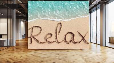 Word Relax is hand written on sand Wall mural