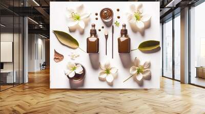  a table topped with two bottles of liquid and a spoon next to flowers and a jar of chocolate sauce on top of a white surface.  generative ai Wall mural