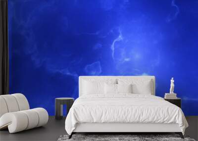 A blue space background with stars and a galaxy Wall mural