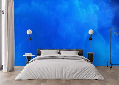 A blue space background with stars and a galaxy Wall mural