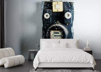 Old dusty electric meter on white wall Wall mural