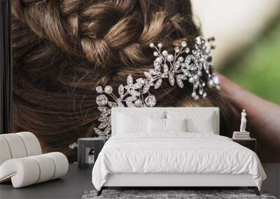 Hairpin in the bride's hair, wedding hairstyle with accessories with jewelery Wall mural