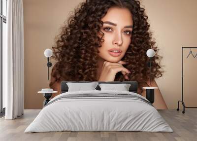 Fashion studio portrait of beautiful smiling woman with afro curls hairstyle. Fashion and beauty Wall mural