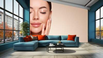 Portrait beautiful young woman with clean fresh skin. Model with healthy skin, close up portrait. Cosmetology, beauty and spa Wall mural