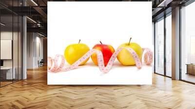 Healthy lifestyle concept. Apple collection with measuring tape. Isolate Wall mural