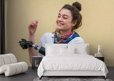 Portrait of a young, happy disabled girl with a prosthesis instead of an arm. Inclusiveness
 Wall mural