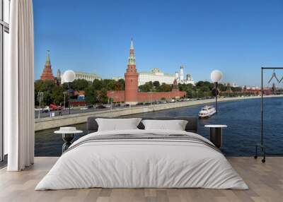 View of the Moscow river and Moscow Kremlin in autumn, clear blue sky background. Beautiful city panorama, russian tourist landmark Wall mural