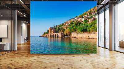 Landscape of ancient shipyard near of Kizil Kule tower in Alanya peninsula, Antalya district, Turkey, Asia. Famous tourist destination with high mountains. Part of ancient old Castle. Wall mural