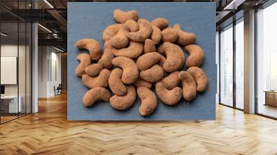 Cashew nuts covered with cocoa powder, close up, top view. Balinese dessert, Indonesia, Bali Wall mural