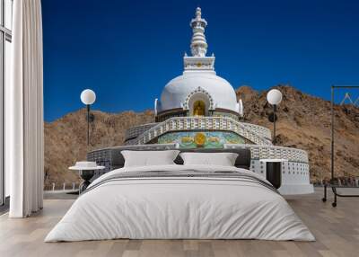 White buddhist stupa or pagoda in tibetan monastery near village Leh in ladakh, noth India Wall mural