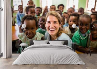 A Joyous Scene: Smiling Children and Teacher in a Classroom Wall mural