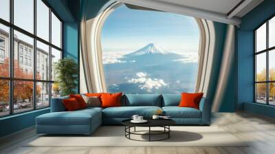 a view of a mount fuji mountain is seen through the window of an airplane Wall mural