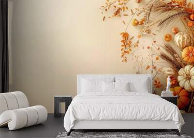 Autumnal Pumpkins and Wheat Sprigs on a Beige Background Wall mural