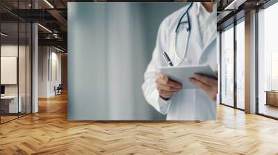 Doctor Taking Notes in a Clinical Setting During Daytime Wall mural