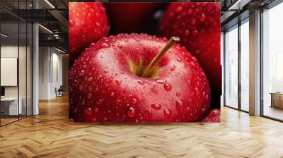 Freshly harvested red apples glistening with droplets after a recent rain Wall mural